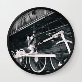 Retro steam locomotive wheels and rods. Details of mechanical parts. Wall Clock