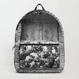 Old Italian wall overgrown with roses Backpack
